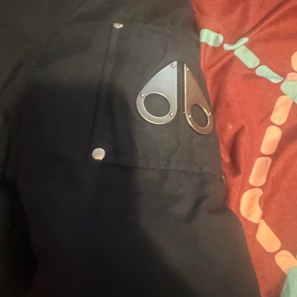 Moose Knuckles Black Jacket with Red and White Details